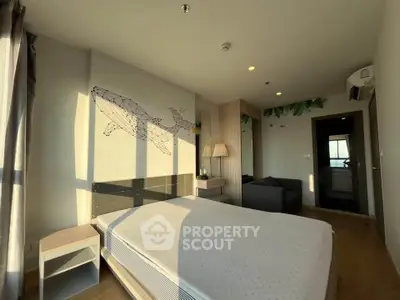 Modern bedroom with large windows and stylish decor in a high-rise apartment.