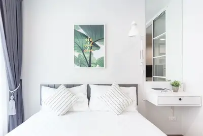 Bright modern bedroom with stylish decor and natural light