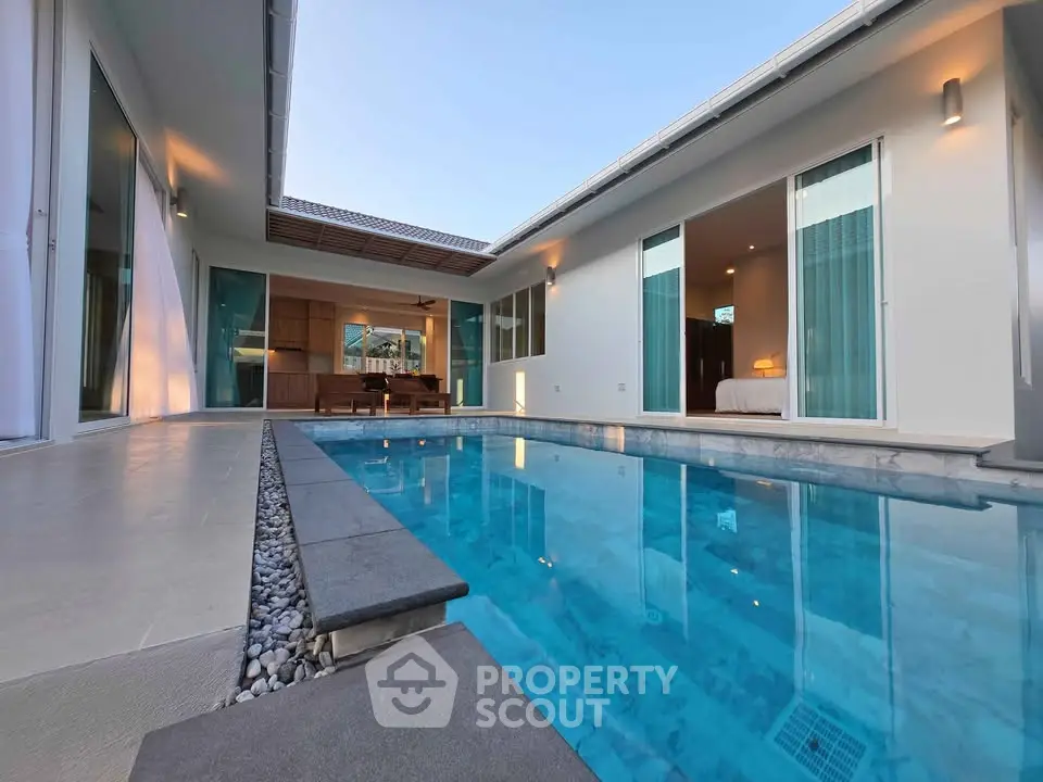 Luxurious modern villa with private pool and elegant interior design, perfect for relaxation and entertainment.