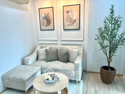 Chic modern living room with stylish decor and cozy seating area, perfect for relaxation and entertaining.
