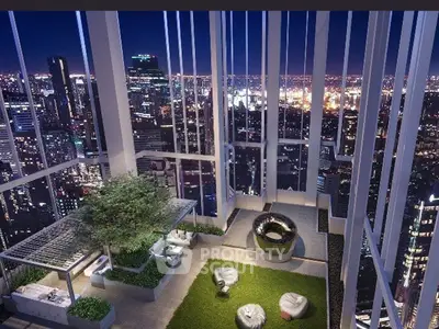 Luxurious rooftop terrace with stunning city skyline view at night, featuring modern seating and greenery.