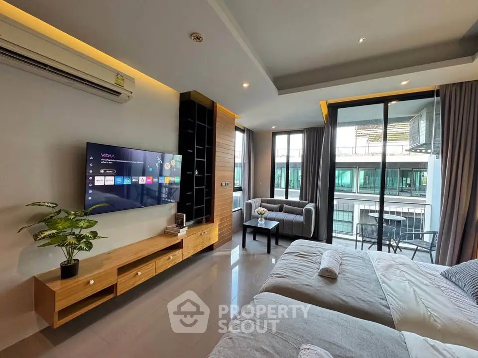 Modern bedroom with balcony and stylish decor in luxury apartment