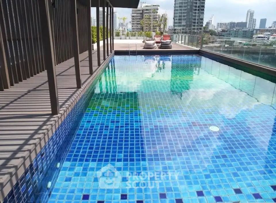 Luxurious rooftop pool with stunning city views and modern design.