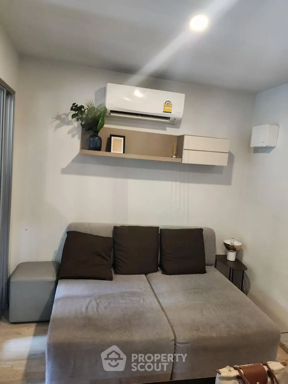 Cozy living room with modern air conditioning and stylish decor