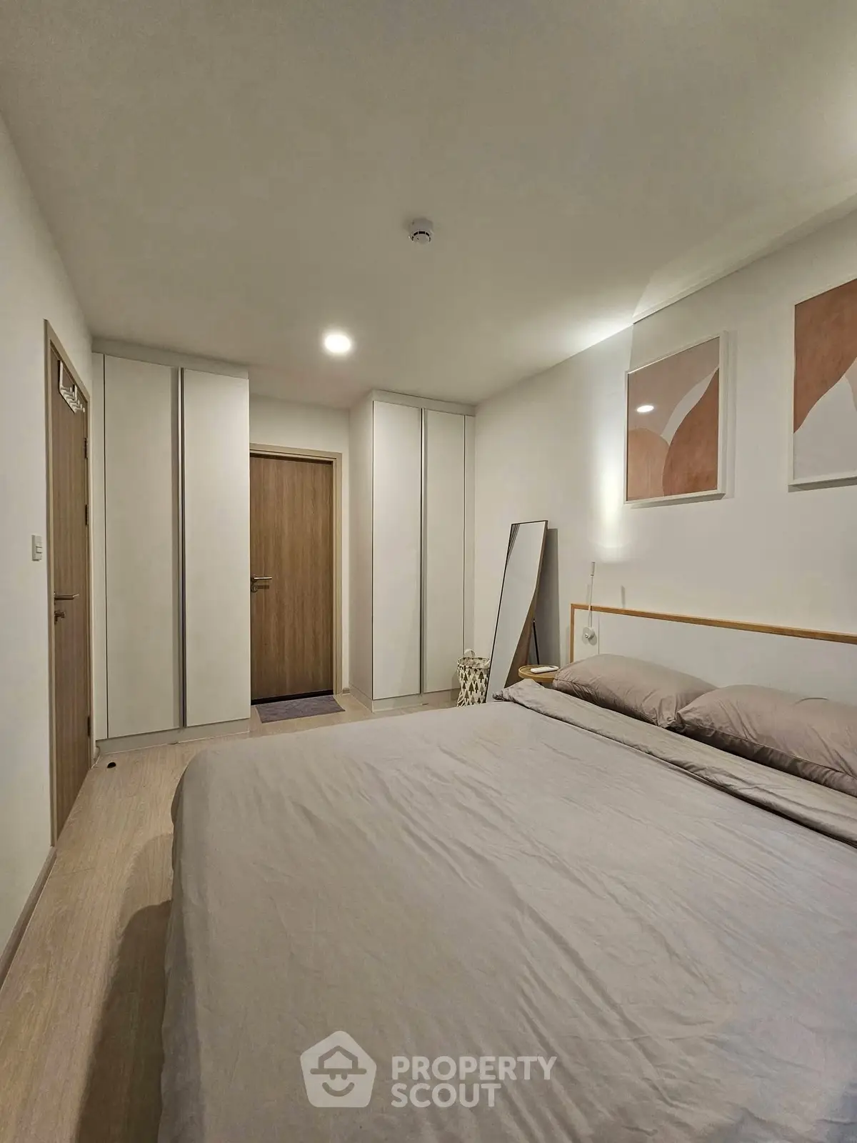 Modern bedroom with minimalist design and cozy ambiance