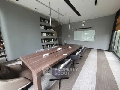 Modern study room with sleek design and large windows