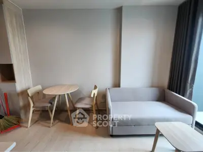 Modern living room with minimalist furniture and natural light
