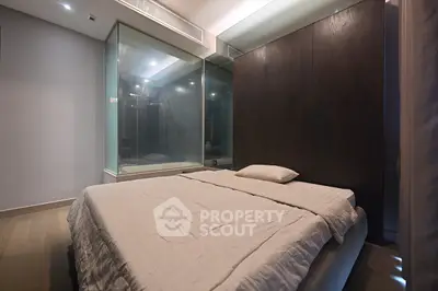 Modern bedroom with glass wall and minimalist design