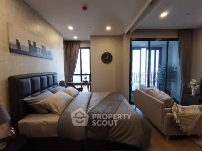 Luxurious bedroom with balcony access and stylish decor