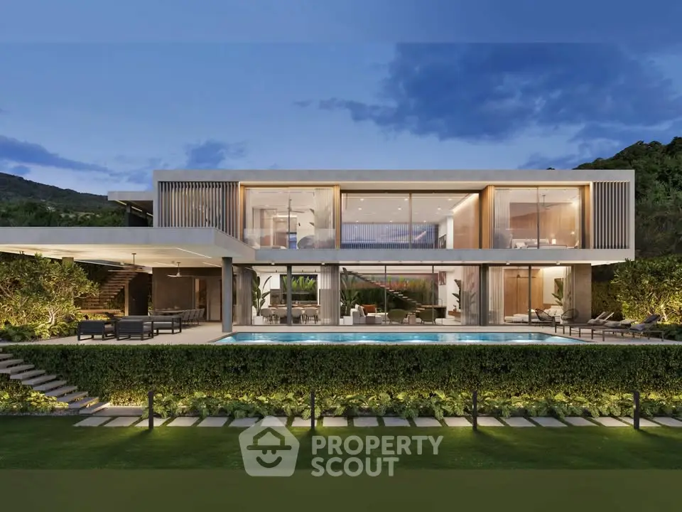 Luxurious modern villa with stunning pool and garden view at twilight