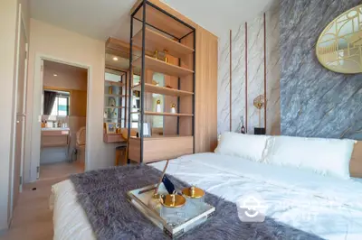 Luxurious modern bedroom with stylish decor and ensuite bathroom