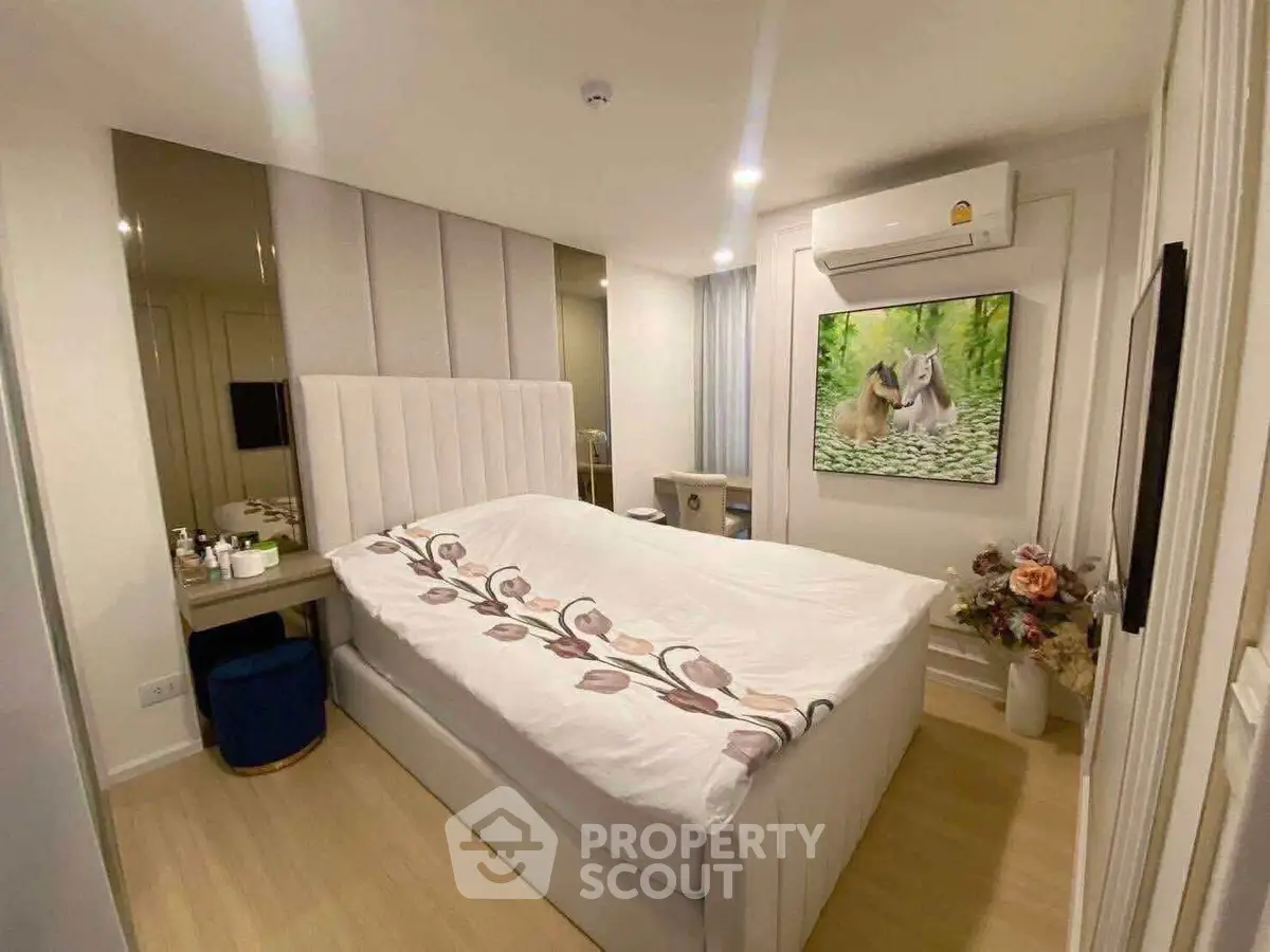 Cozy bedroom with modern decor and air conditioning