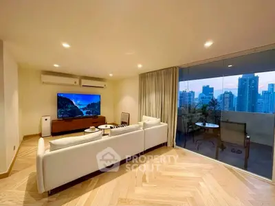 Luxurious living room with city view and spacious balcony in modern apartment.
