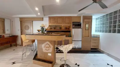 Modern kitchen with open layout and stylish bar seating