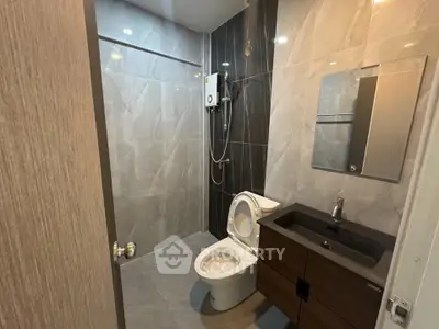 Modern bathroom with sleek fixtures and elegant tile design