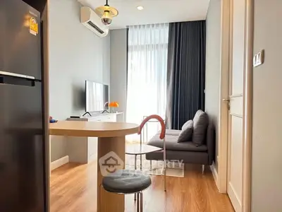 Modern living room with sleek furniture and natural light