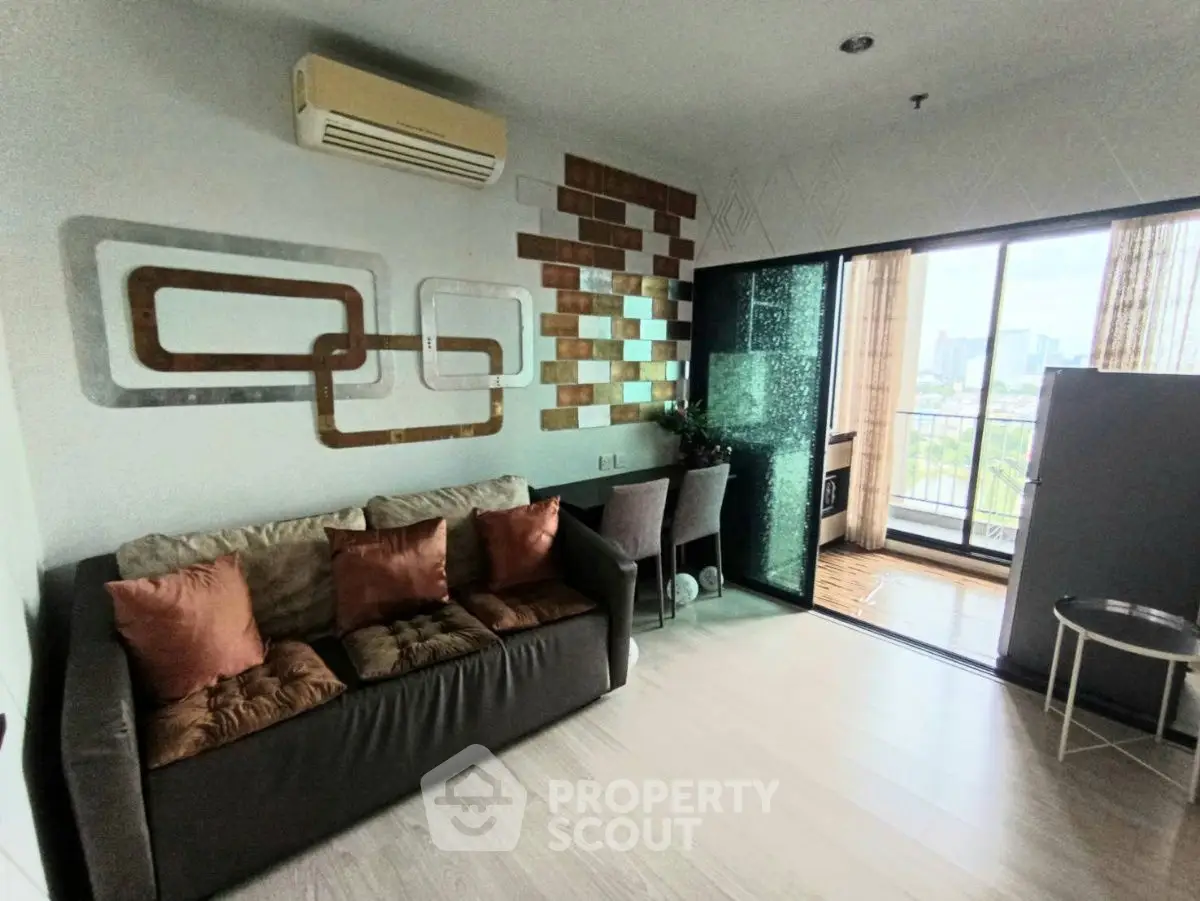 Modern living room with stylish decor and balcony view in urban apartment
