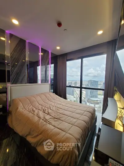 Luxurious bedroom with stunning city view and modern decor