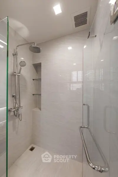 Modern bathroom with sleek shower design and glass enclosure