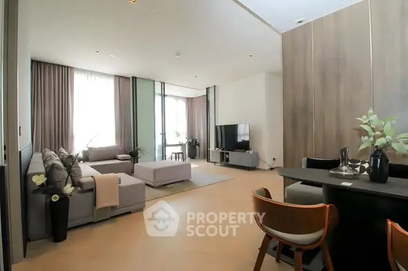 Spacious modern living room with elegant decor and ample natural light
