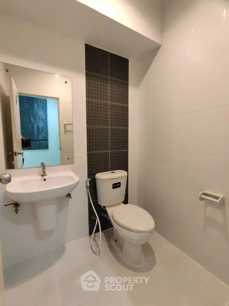 Modern bathroom with sleek fixtures and elegant tile design