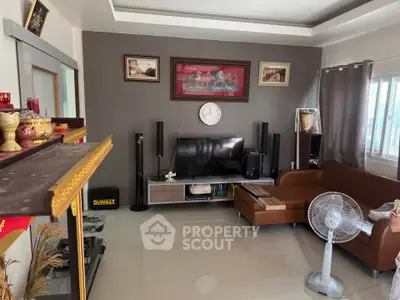 Modern living room with sleek furniture and entertainment center