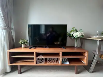 Modern living room with sleek TV stand and elegant decor