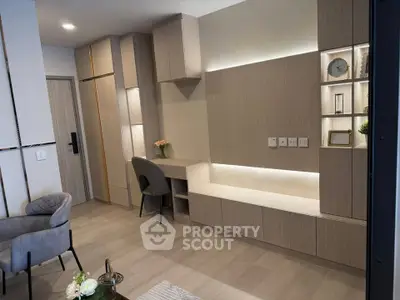 Modern living room with stylish built-in storage and elegant decor
