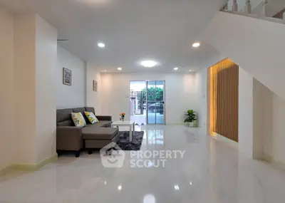 Spacious modern living room with sleek design and natural light