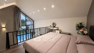 Luxurious bedroom with modern decor and large window overlooking a pool, featuring elegant lighting and stylish furnishings.