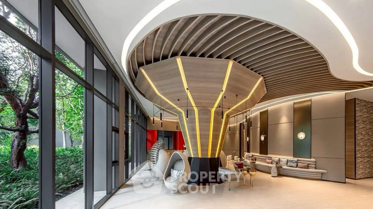 Luxurious modern living room with unique ceiling design and stylish seating area.