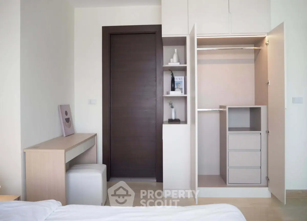 Modern bedroom with open closet and minimalist decor