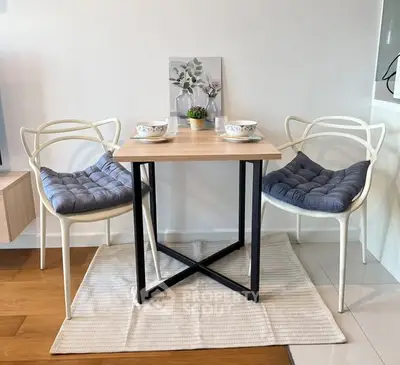 Chic dining nook with modern chairs and cozy decor