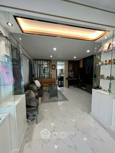 Spacious modern living room with elegant decor and ample natural light