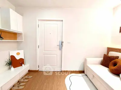 Modern living room with white sofa and minimalist decor