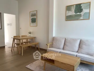 Modern living room with minimalist wooden furniture and stylish decor