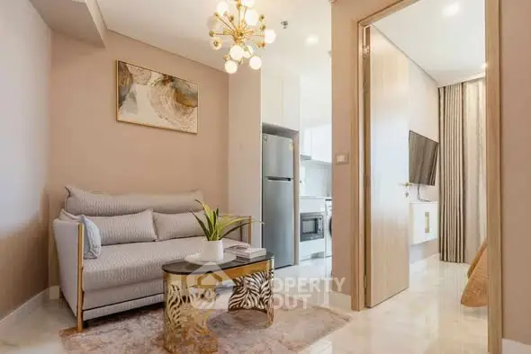 Modern living room with elegant decor and open kitchen layout