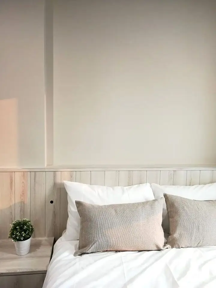 Cozy bedroom with neutral tones and stylish decor