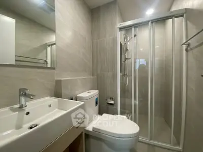 Modern bathroom with sleek shower and contemporary fixtures