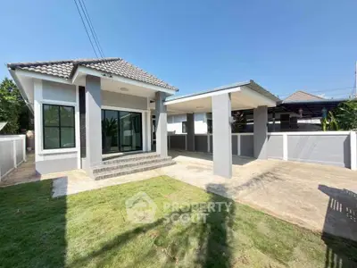 Charming single-story home with modern design and spacious driveway