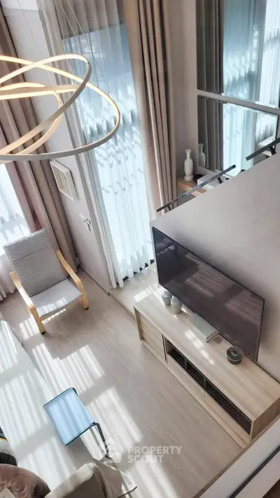 Modern living room with high ceilings and stylish decor