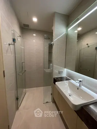 Modern bathroom with sleek design and spacious shower area