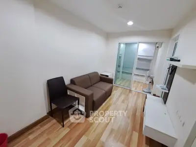 Cozy living room with modern furniture and wooden flooring