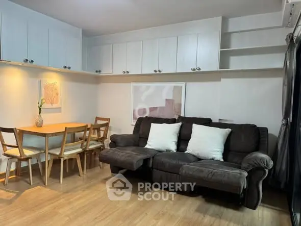 Cozy living room with modern furniture and stylish decor, perfect for relaxation and entertaining.
