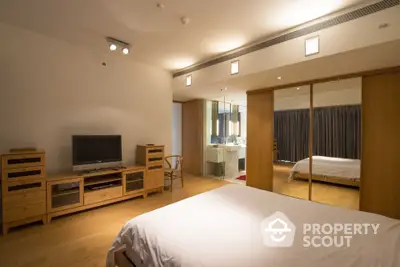 Spacious bedroom with modern design and ensuite bathroom