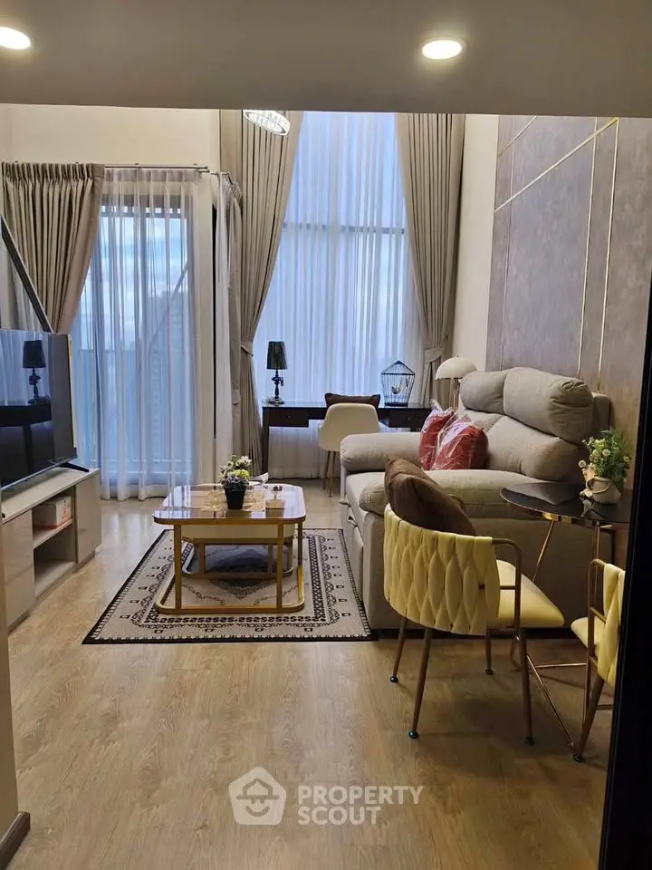 Elegant living room with high ceilings and stylish decor