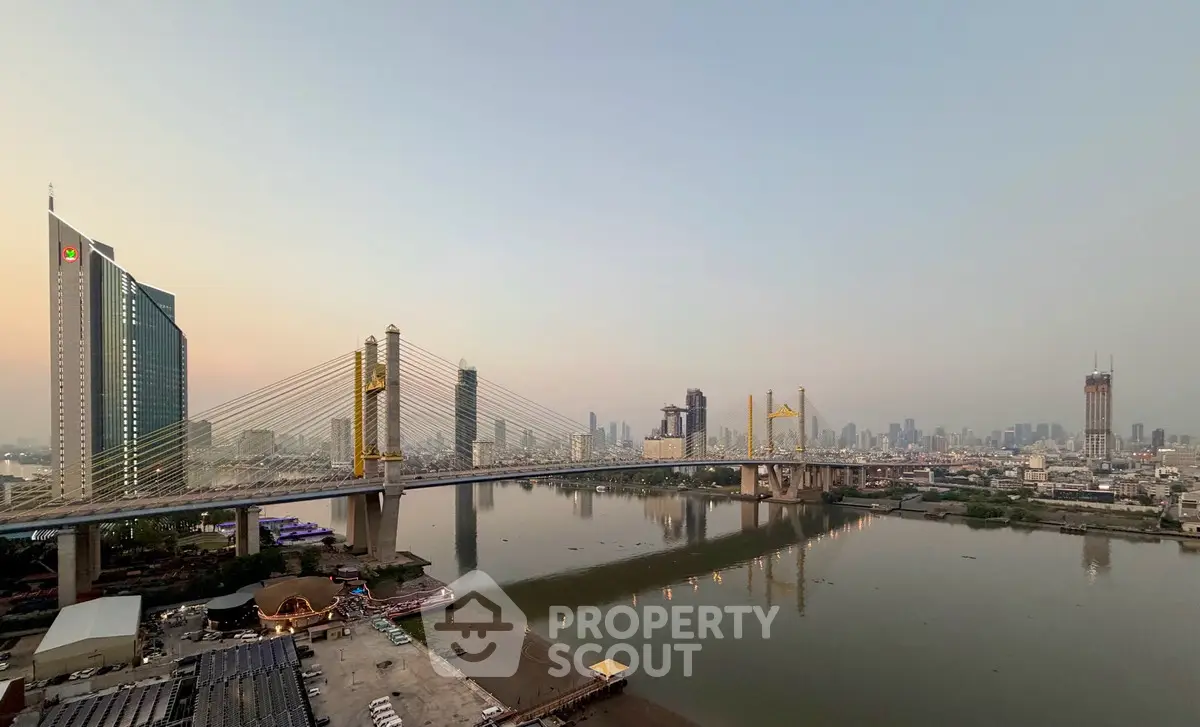 Stunning cityscape view with modern bridge and skyline at sunset