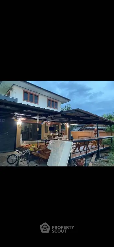 Charming two-story home with spacious outdoor patio and modern design.