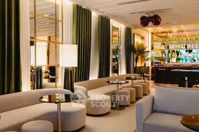 Luxurious modern lounge with elegant seating and stylish bar area, perfect for upscale entertaining.