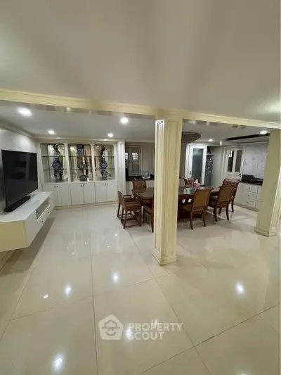 Spacious living room with elegant dining area and modern decor